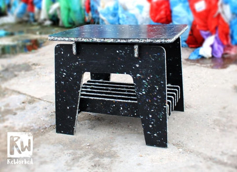Outdoor furniture made out of recycled used PPE facemasl, covif test kits and many other plastic